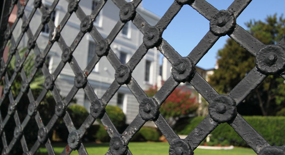 home fortified with iron fence