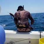 speargun fishing from boat